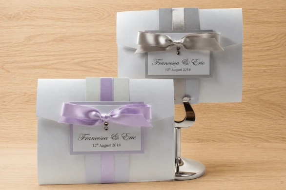 Lilac and white Pocketfold wedding invitation with tied ribbon bow and sparkly crystals